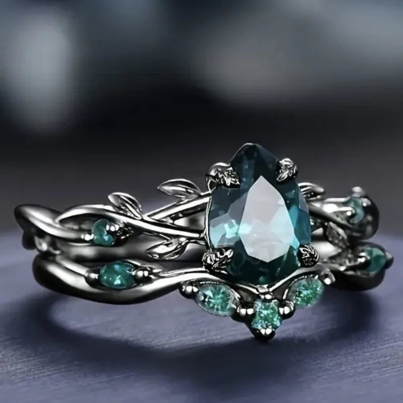 Black Ring with Inlaid with Ocean Green Stones