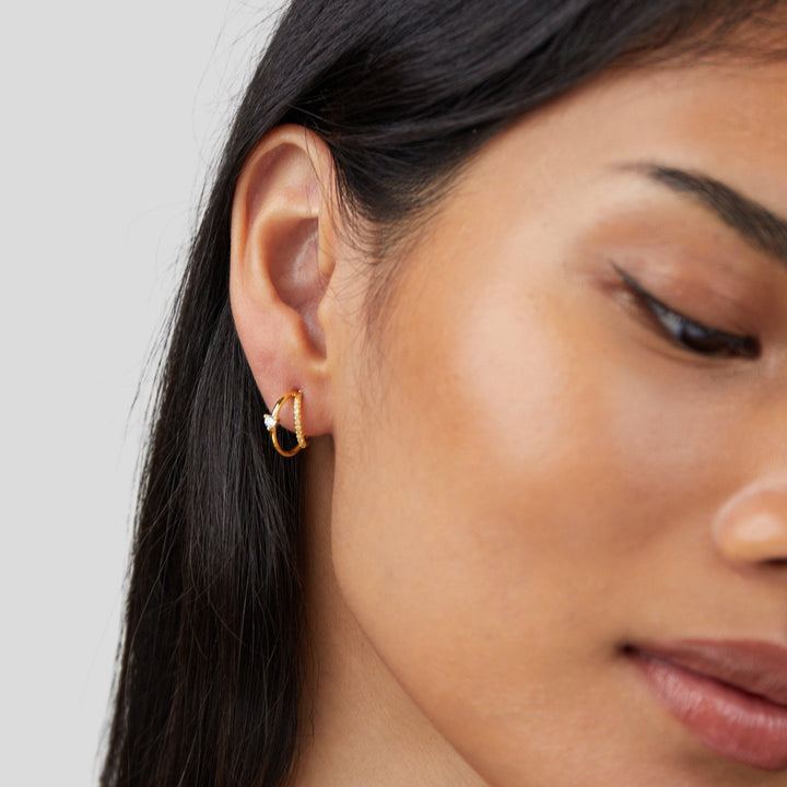 Diamond touch gold earrings